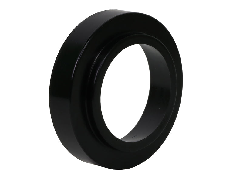 Spring - pad bushing