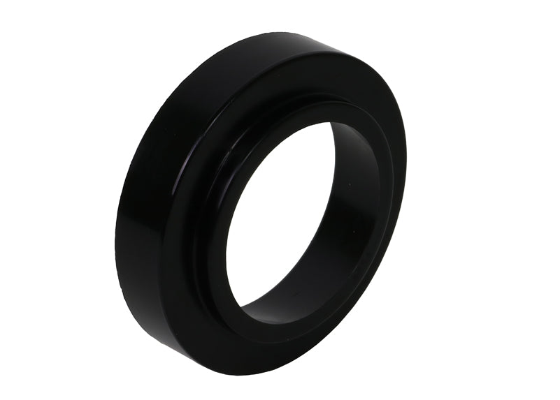 Spring - pad bushing
