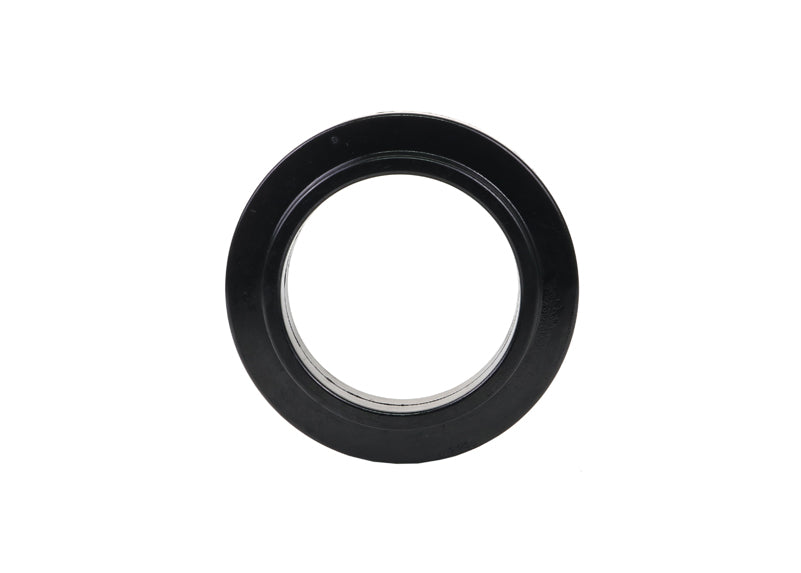 Spring - pad upper bushing