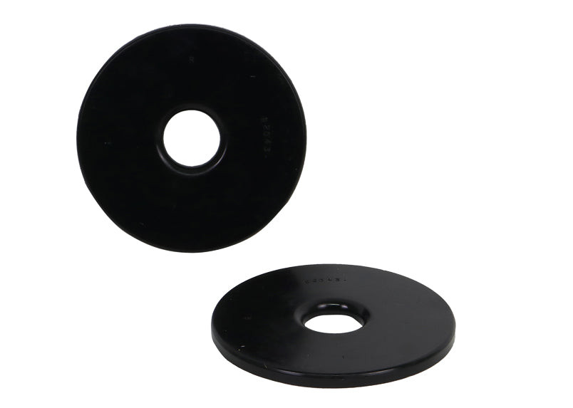 Spring - pad lower bushing