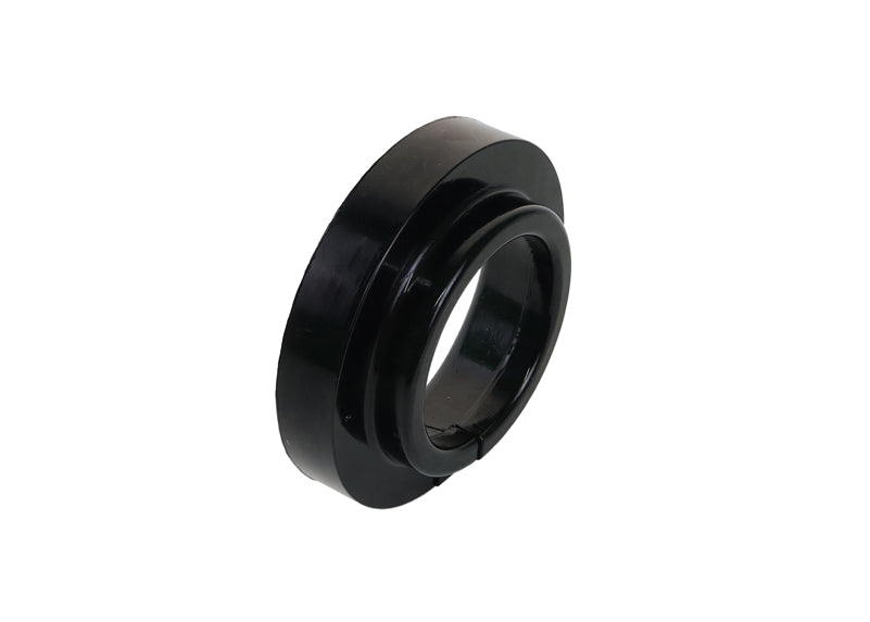 Spring - pad lower bushing