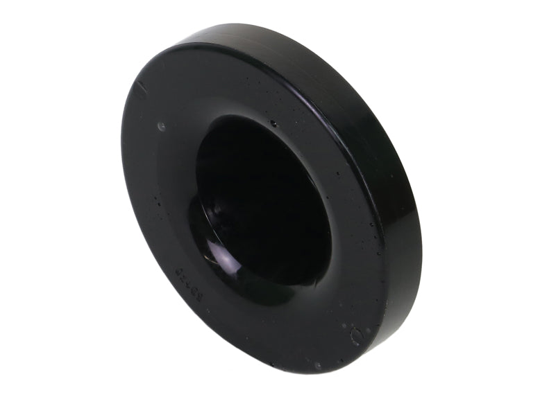 Spring - pad upper bushing