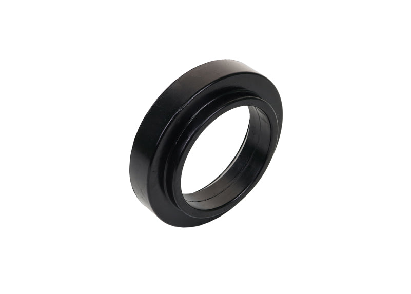 Spring - pad upper bushing